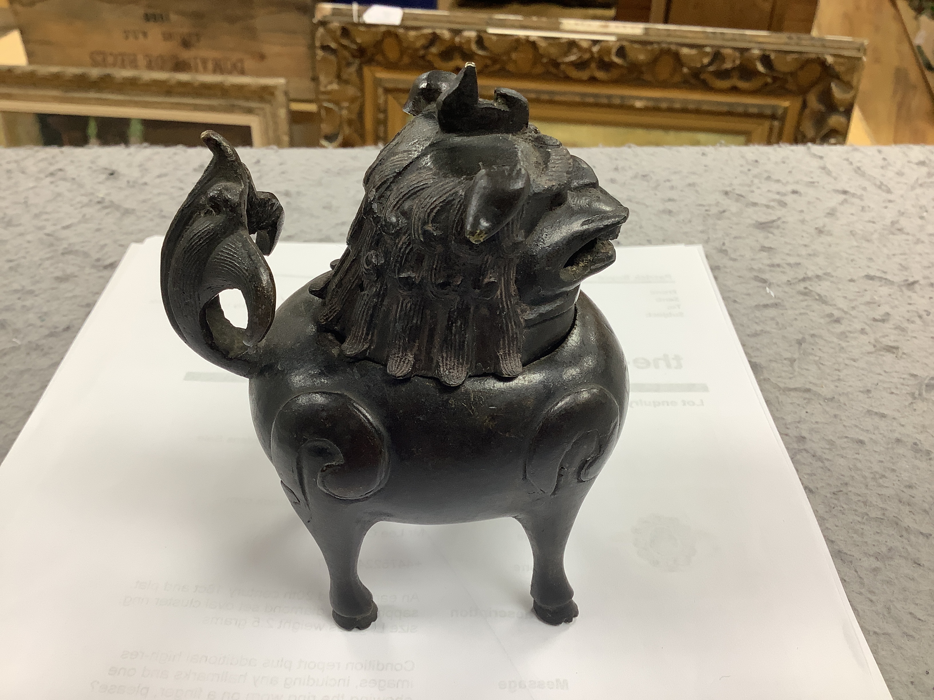 A Chinese bronze mythical beast censer and cover (Luduan), 17th century, the cover with pierced mouth, 9cm in length